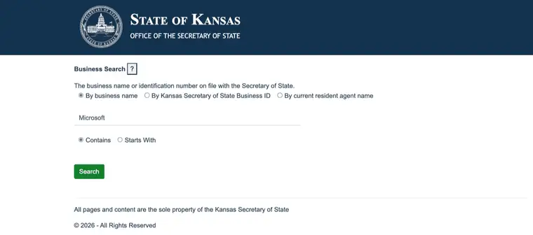 Kansas Business Search form with the word Microsoft typed into the search field, the By business name option selected, and Contains chosen over Starts With