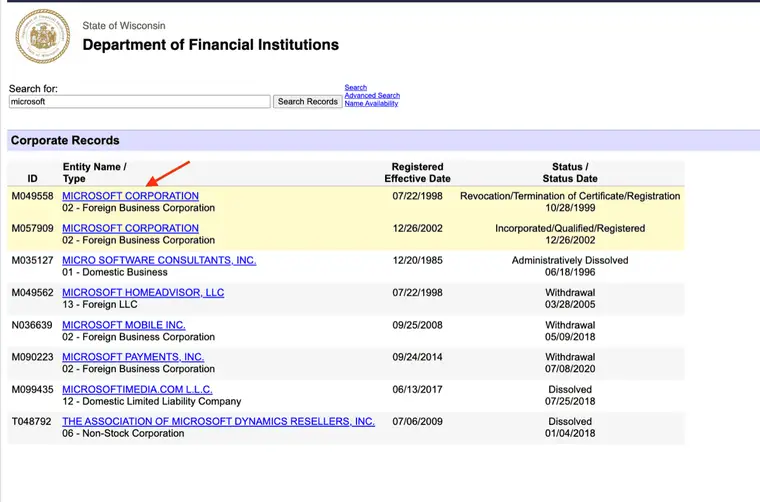 Wisconsin Corporate Records results table for microsoft with ID, Entity Name and Type, Registered Effective Date, and Status columns, including two Microsoft Corporation rows with different statuses