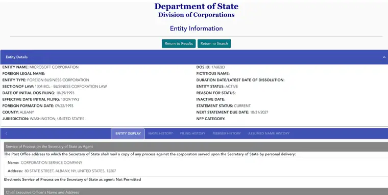 New York Entity Information screen for Microsoft Corporation showing entity name, section of law, county, jurisdiction, DOS ID, entity status, statement status and next statement due date, above tabs for Entity Display, Name History, Filing History, Merger History and Assumed Name History