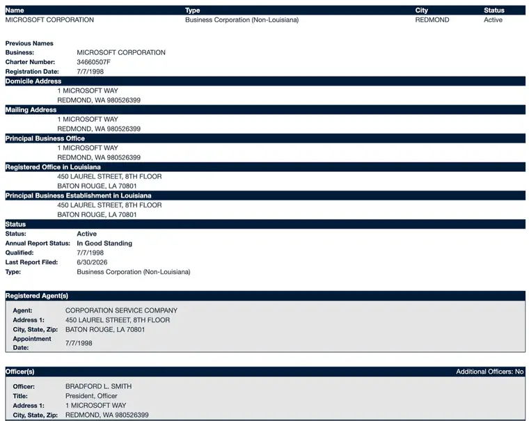 Louisiana CORA entity detail screen for Microsoft Corporation showing Previous Names, Charter Number, Registration Date, domicile and Louisiana registered office addresses, a Status block reading Active and In Good Standing, and registered agent and officer blocks